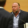 Infowars founder Alex Jones is questioned by plaintiff's attorney Chris Mattei during testimony at the Sandy Hook defamation damages trial at Connecticut Superior Court in Waterbury, Conn. Thursday, Sept. 22, 2022.