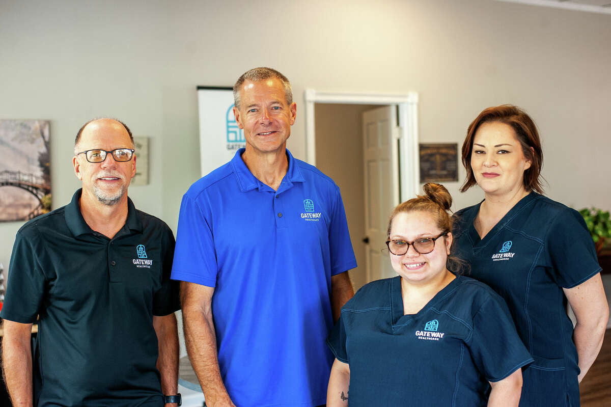 From left to right: Clinic Director James Mier, Director Ed Doerner, receptionist and M.A. MacKenzie Bass, and office Manager and medical assistant Adrienne Schmitt pose at Gateway Healthcare on Sept. 21, 2022 in Midland.
