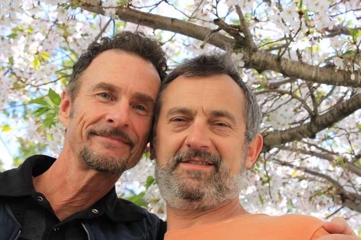 Michael Ritter, left, with his husband of 35 years, Peter Toscani. 