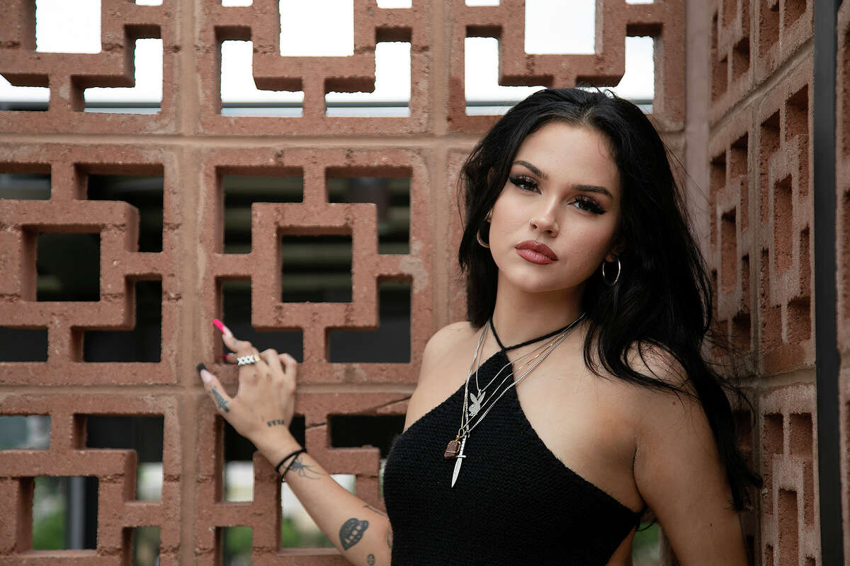 Singer-songwriter Maggie Lindemann poses at Revolucion Coffee + Juice at The Rim while visiting family and friends in San Antonio in July of 2021. Lindemann just released "Suckerpunch," her first full-length album.