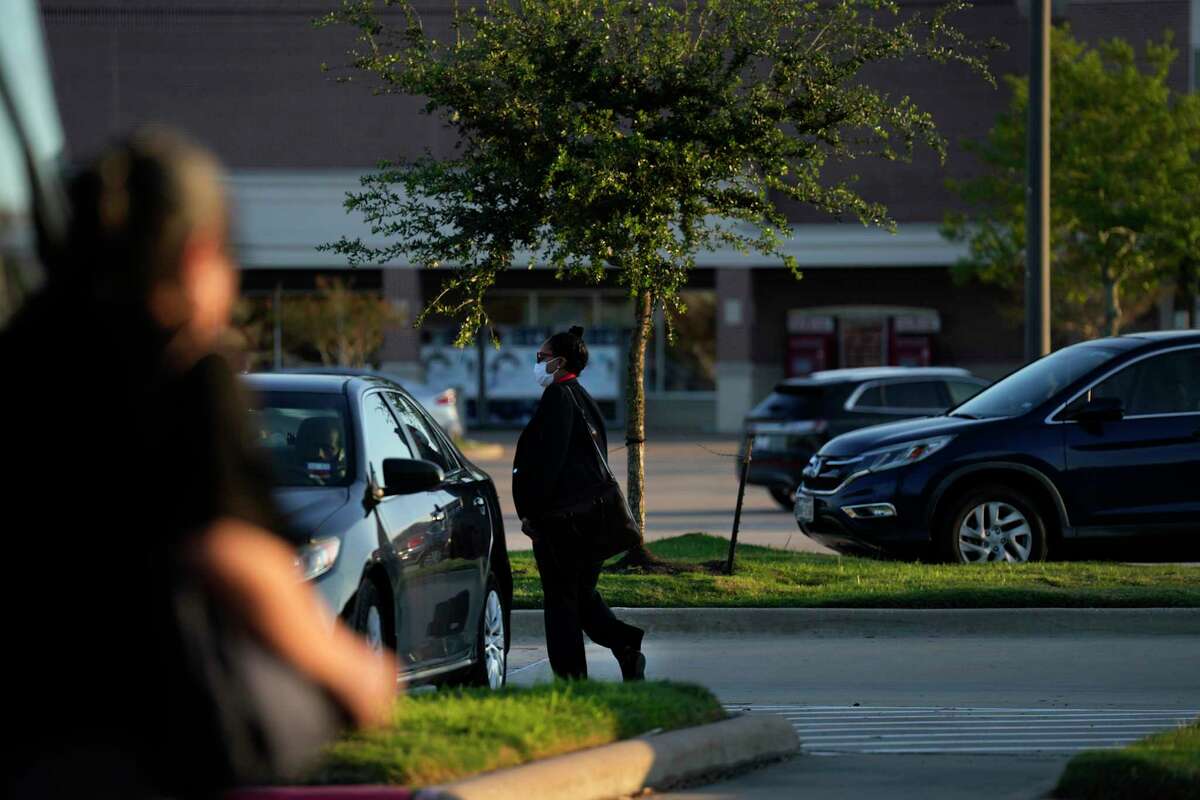 Metropolitan Transit Authority bus drivers return to their vehicles after disembarking the bus at the Missouri City Park and Ride stop near the Fort Bend Tollway and Texas 6 on Wednesday, September 21, 2022, in Missouri City .