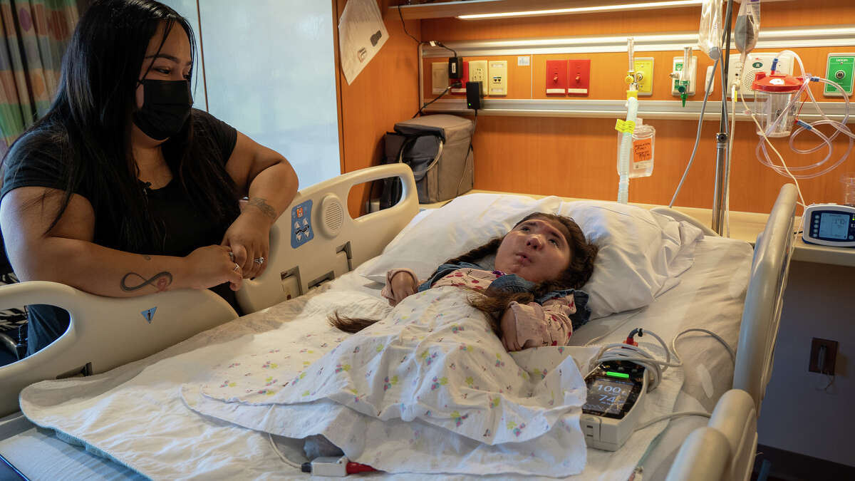 Stamford resident Katherine Rivera looks at her daughter, Maria Rebollar, at Blythedale Children’s Hospital in Valhalla, N.Y.  Maria was born with arthrogryposis multiplex congenita and is now 6 years old.