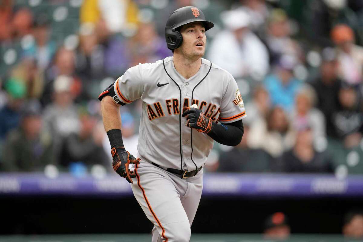 San Francisco Giants' Mike Yastrzemski heads up the first-base line after connecting for a solo home run off Colorado Rockies starting pitcher Jose Urena in the sixth inning of a baseball game Thursday, Sept. 22, 2022, in Denver. (AP Photo/David Zalubowski)