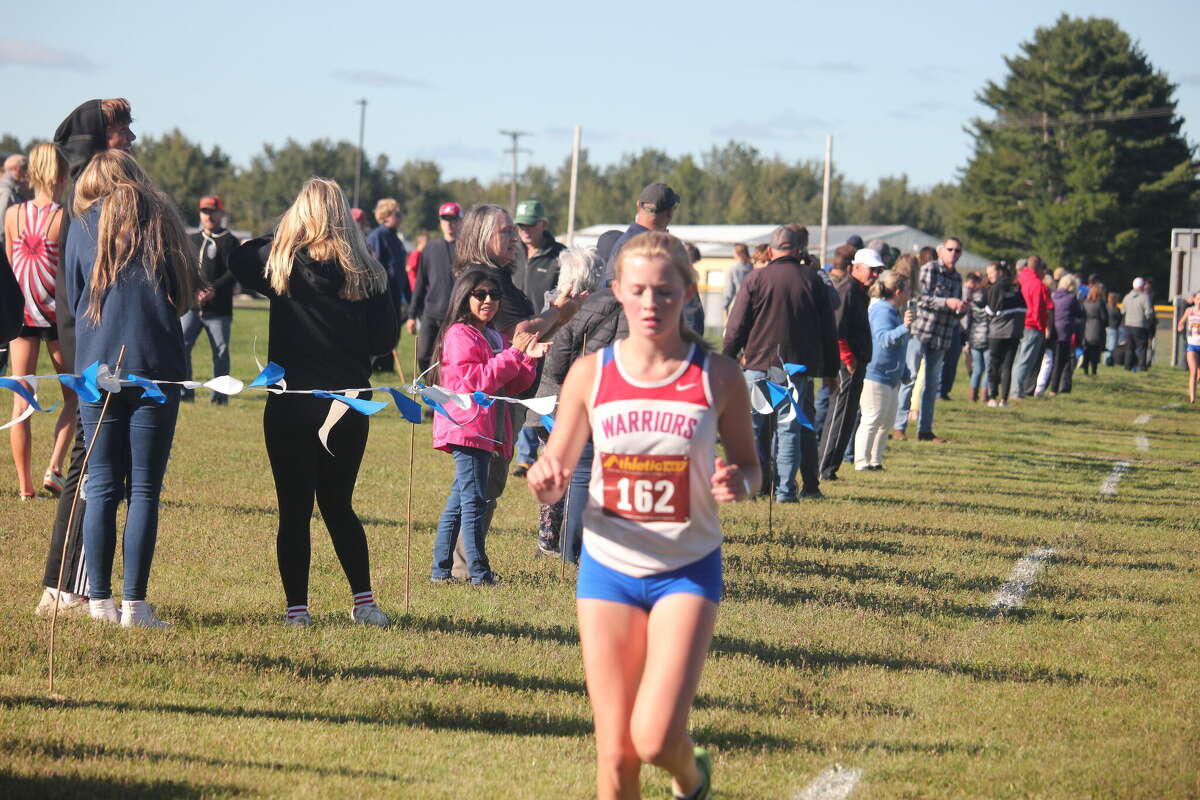 Chippewa Hills' Ava Hollandworth heads to the finish line of Thursday's CSAA race.