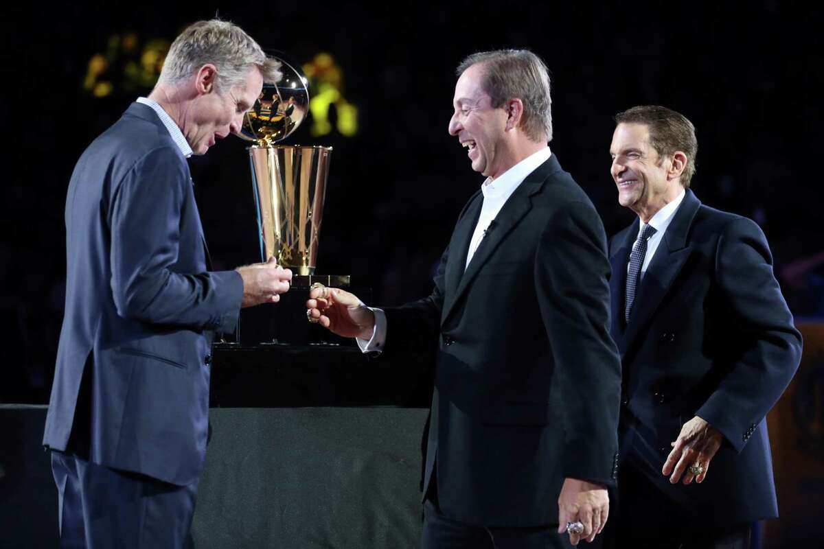Celtics and Suns scandals underscore how good Warriors have it. Golden State Warriors' head coach Steve Kerr receives his 2018 NBA Championship ring from owners Joe Lacob and Peter Guber during ceremony before Opening Night game against Oklahoma City Thunder at Oracle Arena in Oakland, Calif. on Tuesday, October 16, 2018.