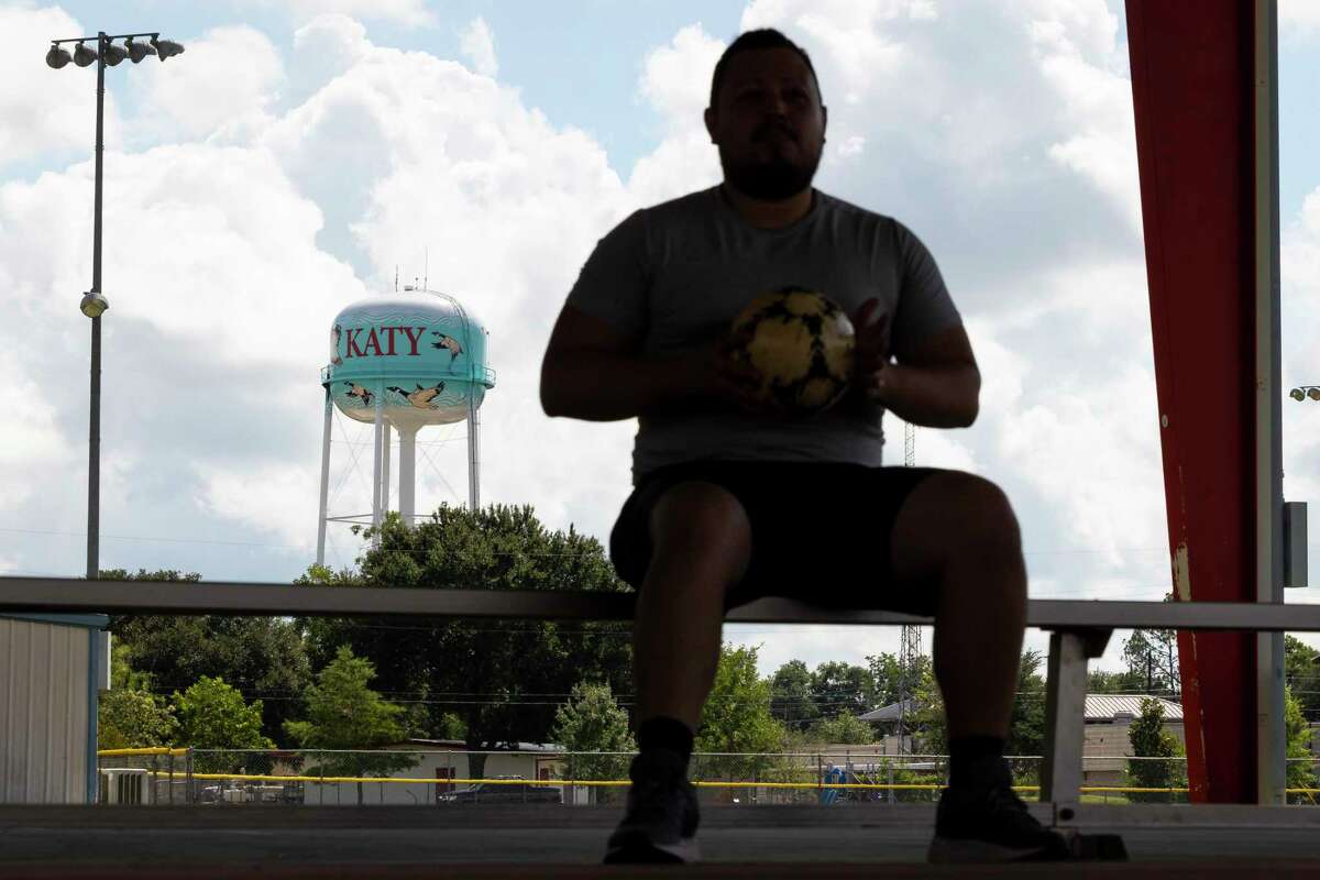 Kristian Obregon shoots pool at Slick Willie’s Family Pool Hall in Katy, TX, on Friday, Sept. 16, 2022. Obregon, 27, a server at a steakhouse restaurant in Houston, is living with his parents to save money while he searches for a new apartment.