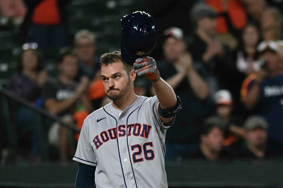 Houston Astros' Trey Mancini (26) waves to the crowd during a second-inning at-bat against the Baltimore Orioles in a baseball game Thursday, Sept. 22, 2022, in Baltimore.