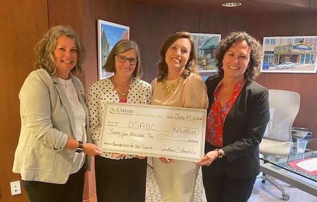 The Union Savings Bank Foundation recently presented a $25,000 grant to the Danbury Student and Business Connection in support of its Foundations for Your Future program. Pictured left to right are: Michele Bonvicini, foundation executive director; Cindy Merkle, foundation president; Susan Queenan, the connection's executive director; and Jen Tomaino, the bank's director of customer experience and the connection’s board chair.