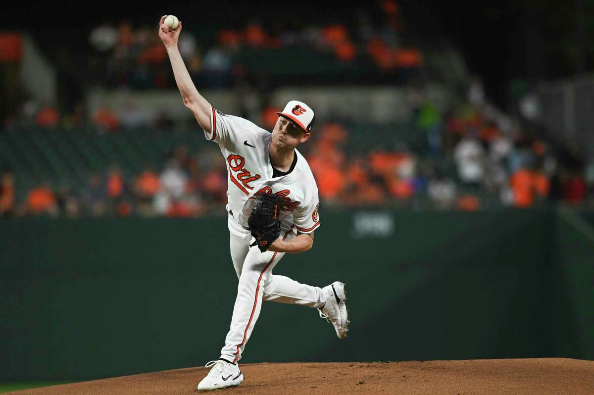 Baltimore Orioles starting pitcher Kyle Bradish throws to a Houston Astros batter during the first inning of a baseball game Thursday, Sept. 22, 2022, in Baltimore.