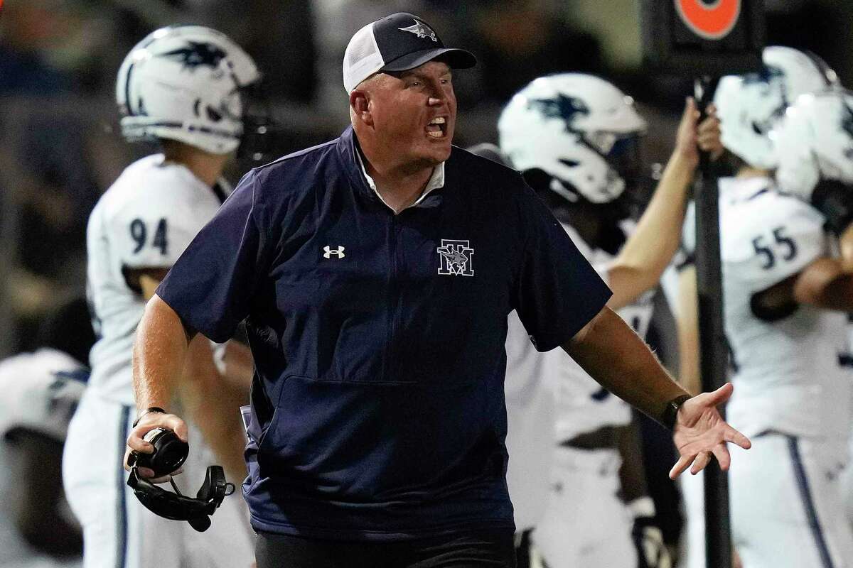 Tomball Memorial head coach Sam Parker argues a call during the second half of a high school football game against Klein Cain, Thursday, Sept. 22, 2022, in Klein.
