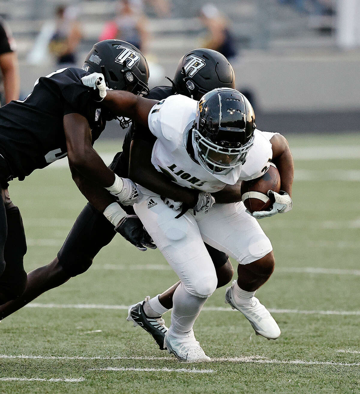 ROSENBERG, TX - SEPTEMBER 22: Lake Creek Lions running back Ty Byars (21) runs with the ball during a high school football, District 10-5A Division II game between the Randle Lions and the Lake Creek Lions on September 22, 2022 at Traylor Stadium in Rosenberg, Texas. (Photo by Bob Levey/Contributor)