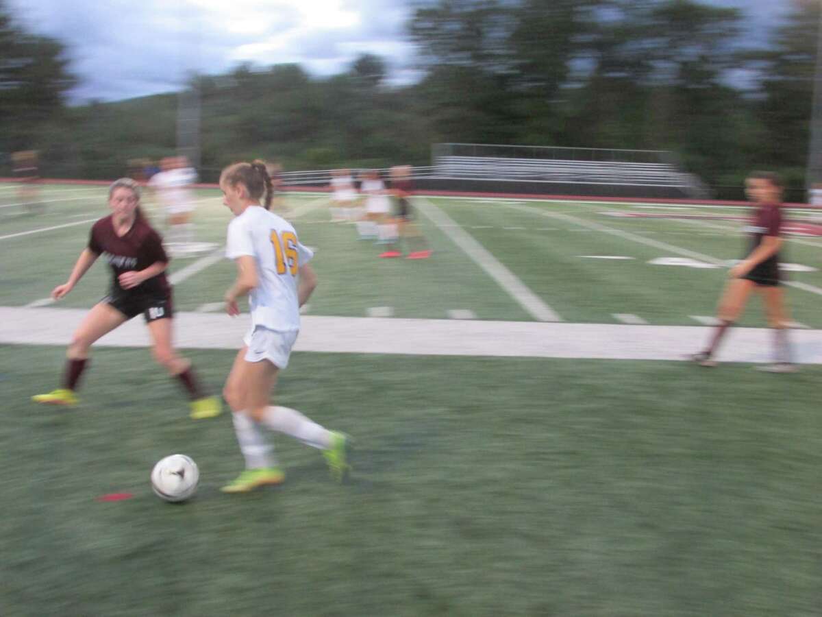 The game focused on Seymour freshman Sofia Morgan working the ball upfield in a girls soccer win Thursday night at Torrington's Robert H. Frost Sports Complex.