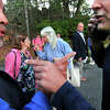 Protesters argue and point fingers at each other before a Board of Education meeting at Central Middle School in Greenwich, Conn., on Thursday September 22, 2022. A rally organized by the Greenwich Patriots was held before the meeting. It is in reaction to Project Veritas's video of Cos Cob vice principal Jeremy Boland.