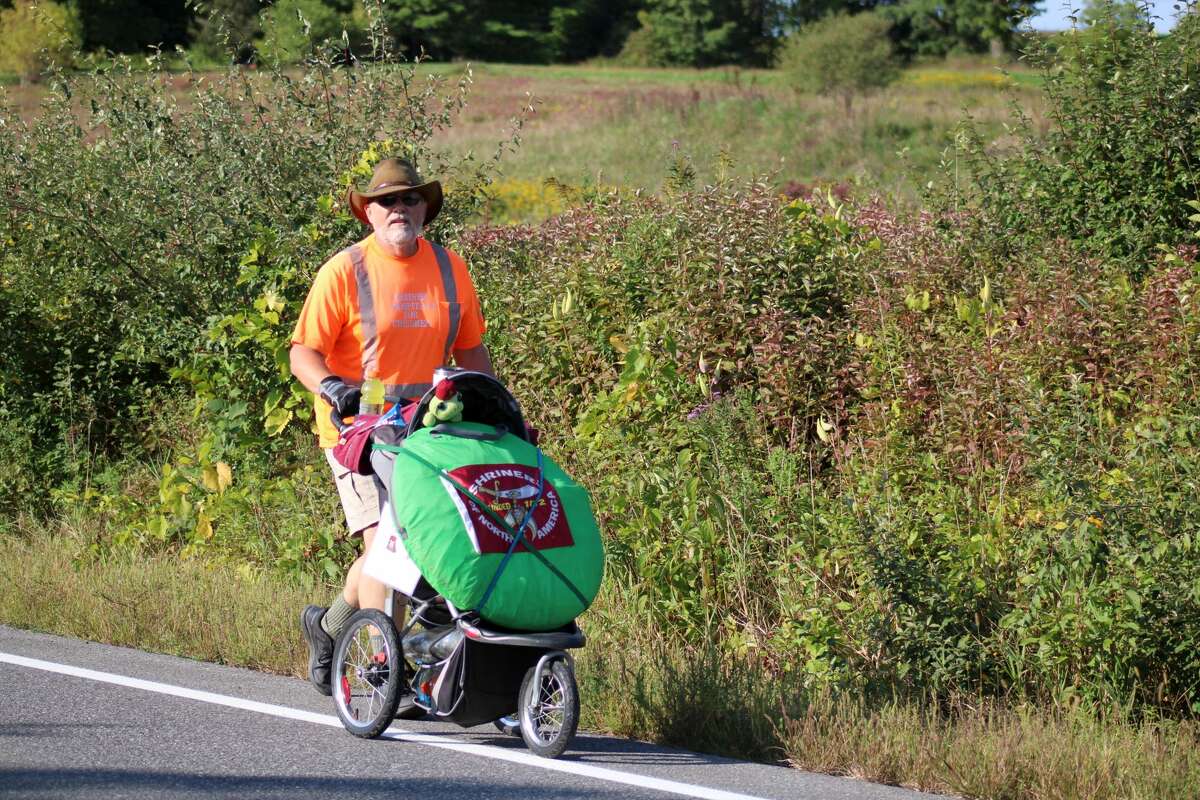 Eric Morabito, the “Walking Man” of Greene County, on Friday, Sept. 16, the first day of his 2022 trek to Boston to raise money and awareness for children’s hospitals.