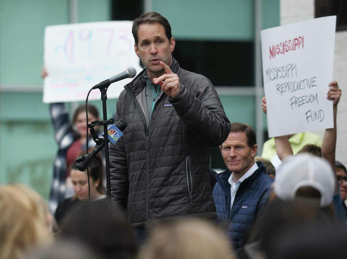 U.S. Rep. Jim Himes, D-Conn., speaks during an abortion rights rally at the Ruth Steinkraus Cohen Bridge in downtown Westport in May.