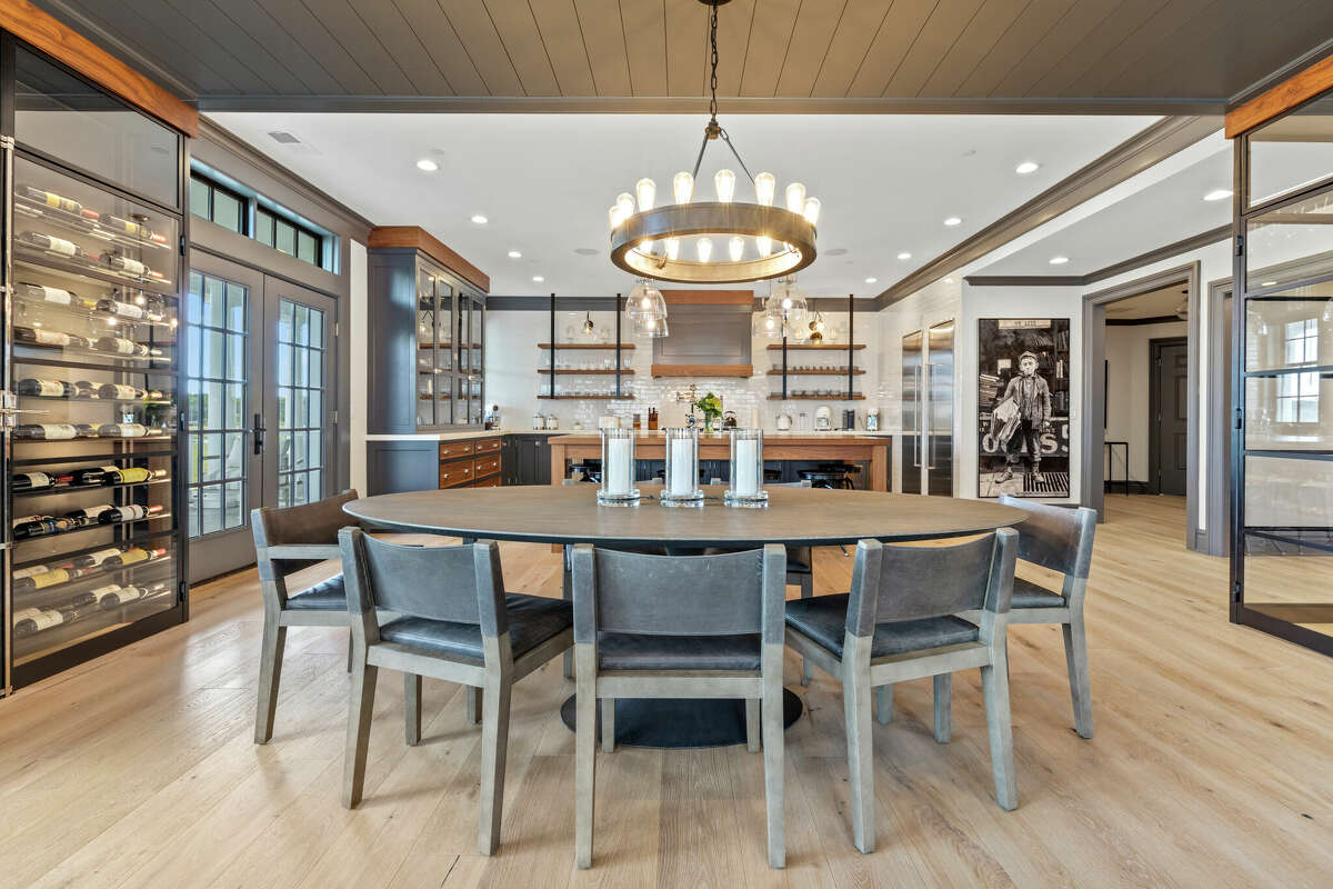Unit 17 at The Residences at 66 High Street in Guilford, Conn. won two Home Builder Industry (HOBI) Awards and features a golf simulator room.