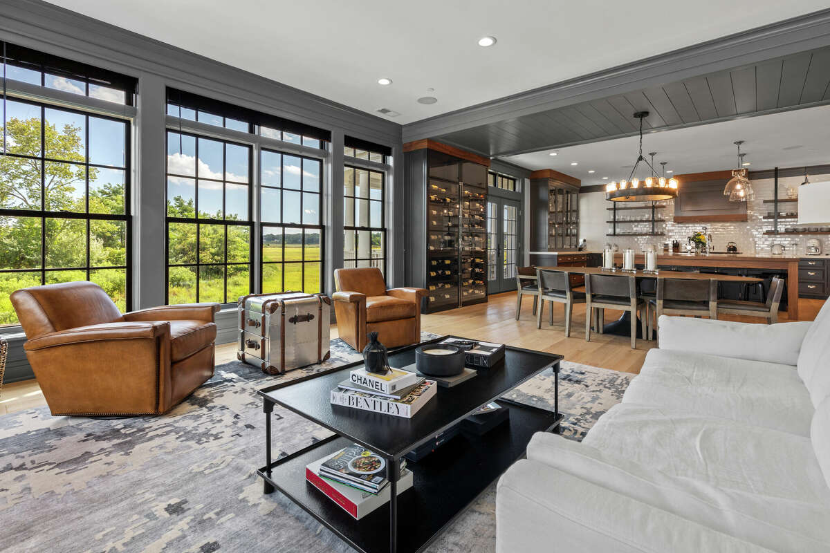 Unit 17 at The Residences at 66 High Street in Guilford, Conn. won two Home Builder Industry (HOBI) Awards and features a golf simulator room.