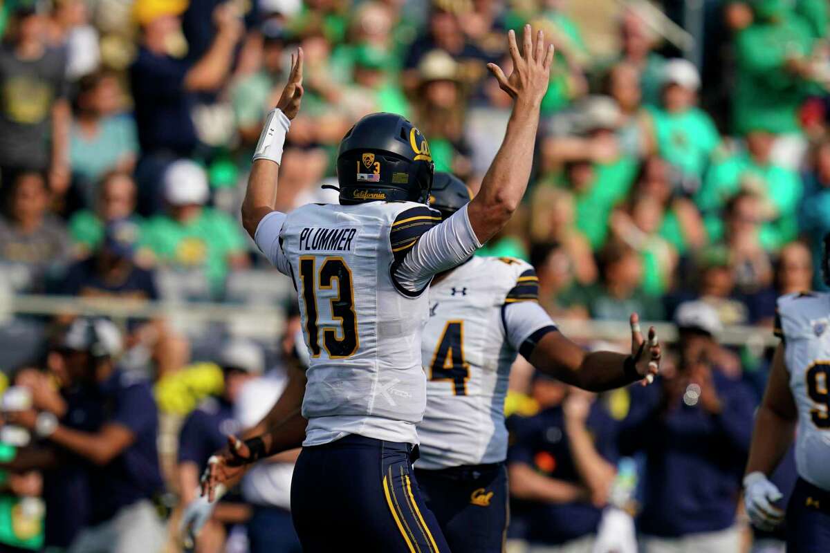 California quarterback Jack Plummer (13) celebrates a touchdown against Notre Dame during the second half of an NCAA college football game in South Bend, Ind., Saturday, Sept. 17, 2022. Notre Dame defeated California 24-17.(AP Photo/Michael Conroy)