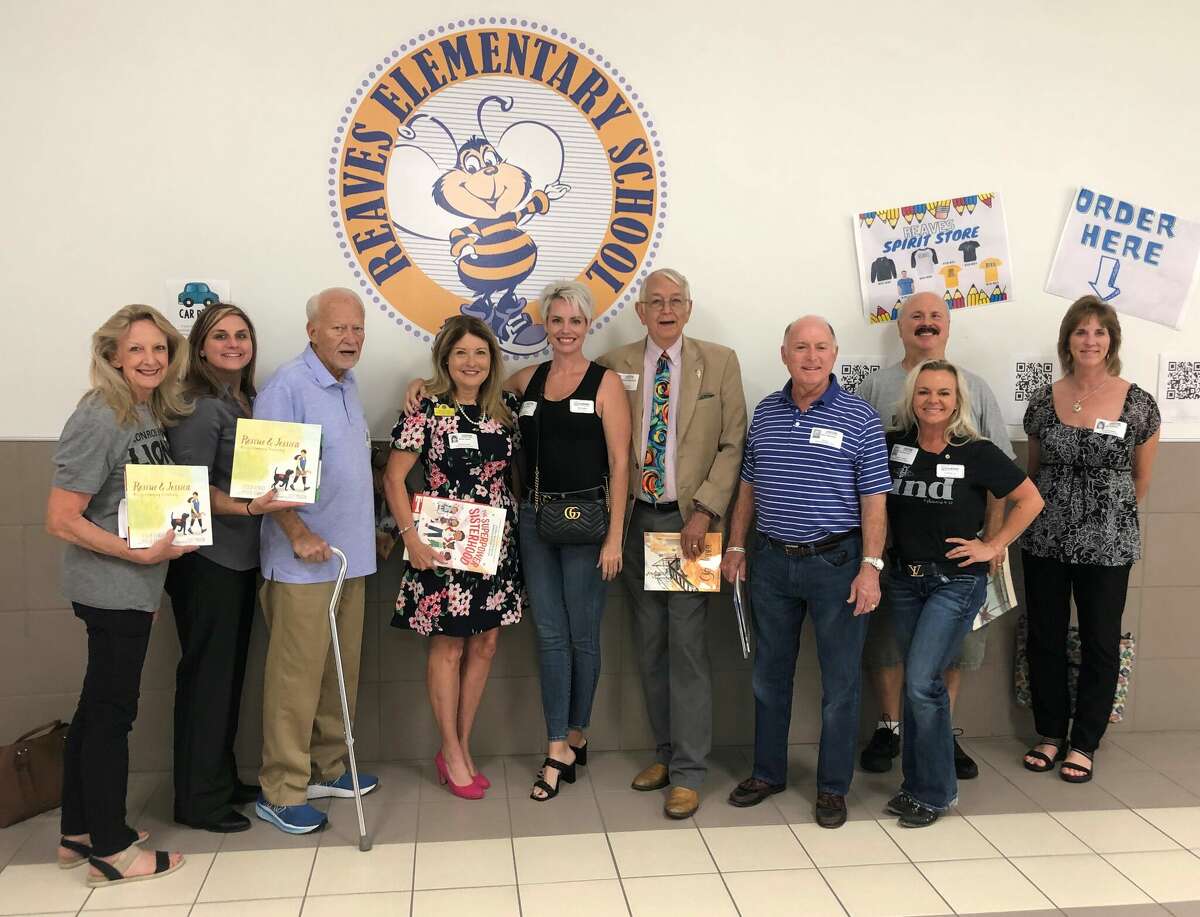 Reading at Reaves – Members of the Conroe Noon Lions Club participated in the CISD – Reading for a Better Life program at their adopted school Reaves Elementary last Wednesday, making sure all classes had a special reading visitor.  Some pictured here: (l-r) Helen Thornton, Amanda Anders, Dave Gritzmacher, Karen Lonon, Jolie Godfrey, George Renneberg, Don Schroeder, Courtney Lum, Ed Roth, and Dana Sullivan.
