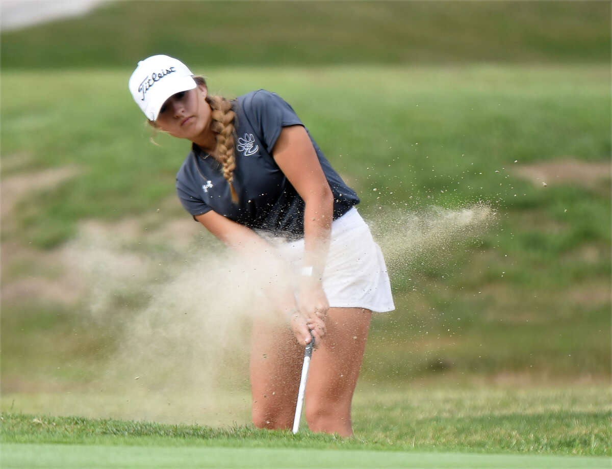 Edwardsville's Alayna Garman hits out of the bunker during the Gary Bair Invitational on Thursday at Oak Brook Golf Club in Edwardsville.