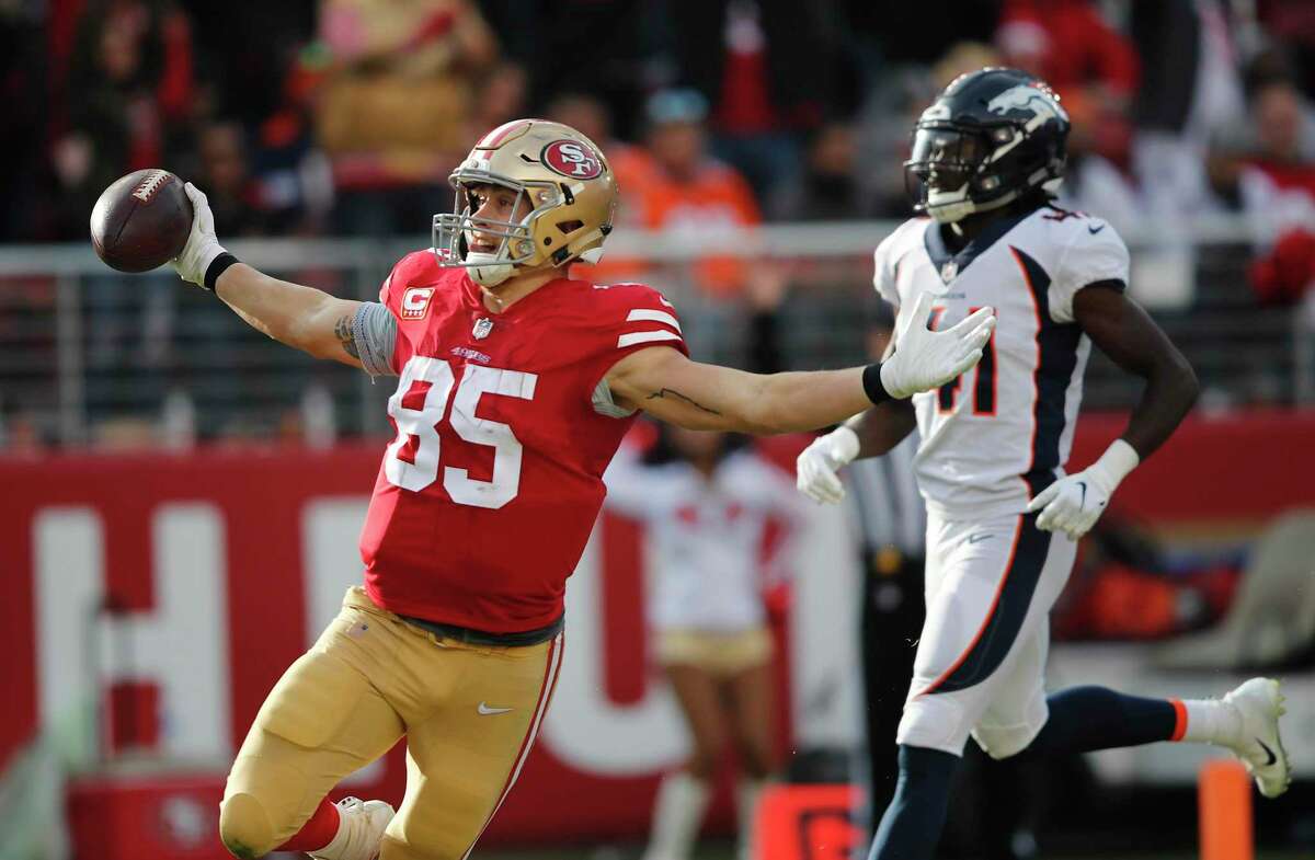 George Kittle of the San Francisco 49ers runs with the ball after  Nfl  football 49ers, San francisco 49ers nfl, San francisco 49ers football