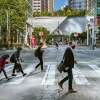 Pedestrians walk to their jobs on Howard Street in downtown San Francisco on Thursday, Sept. 1, 2022.