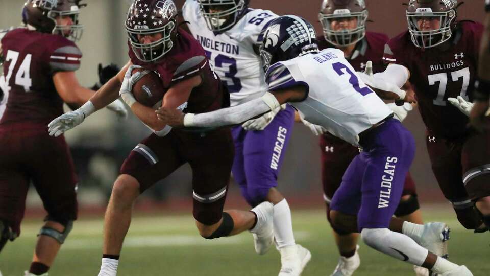 Magnolia running back Hunter Andrews (27) runs the ball during the first quarter of a District 10-5A (Div. I) high school football game at Bulldog Stadium, Friday, Sept. 23, 2022, in Magnolia.