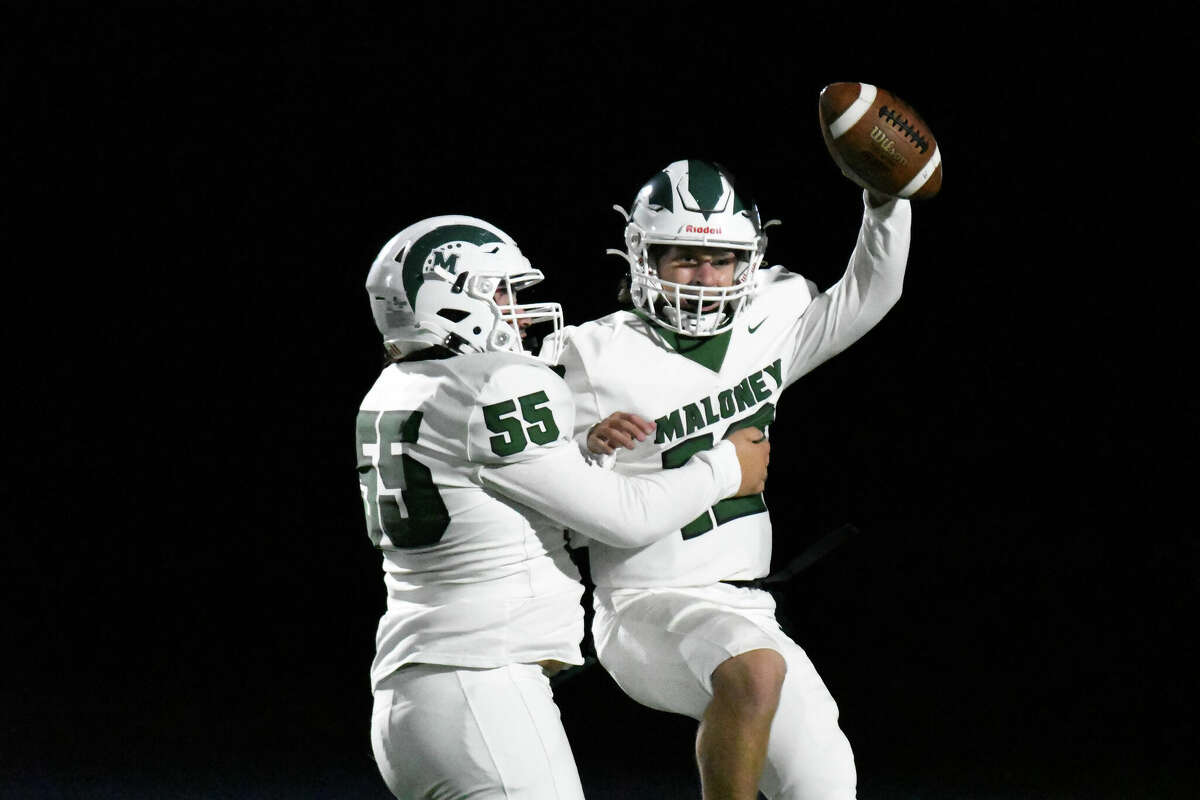 Maloney quarterback Kyle Valentine celebrates after his team's win during a football game between Maloney and Darien at Darien High School, Darien on Friday, Sept. 23, 2022.
