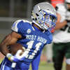 West Haven running back Deven Robinson runs with the ball during a football game between West Haven and Guilford on Friday, Sept. 23, 2022.