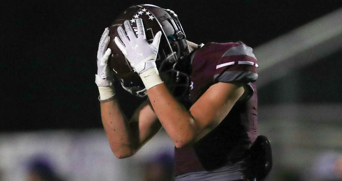 Magnolia wide receiver Andrew Klostermann (8) reacts after Angleton safety Elijah Walker (0) intercepts a pass intended for him during the second quarter of a District 10-5A (Div. I) high school football game at Bulldog Stadium, Friday, Sept. 23, 2022, in Magnolia.