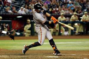 Giants rally in 9th against Arizona to extend streak after Carlos Rodón exits early