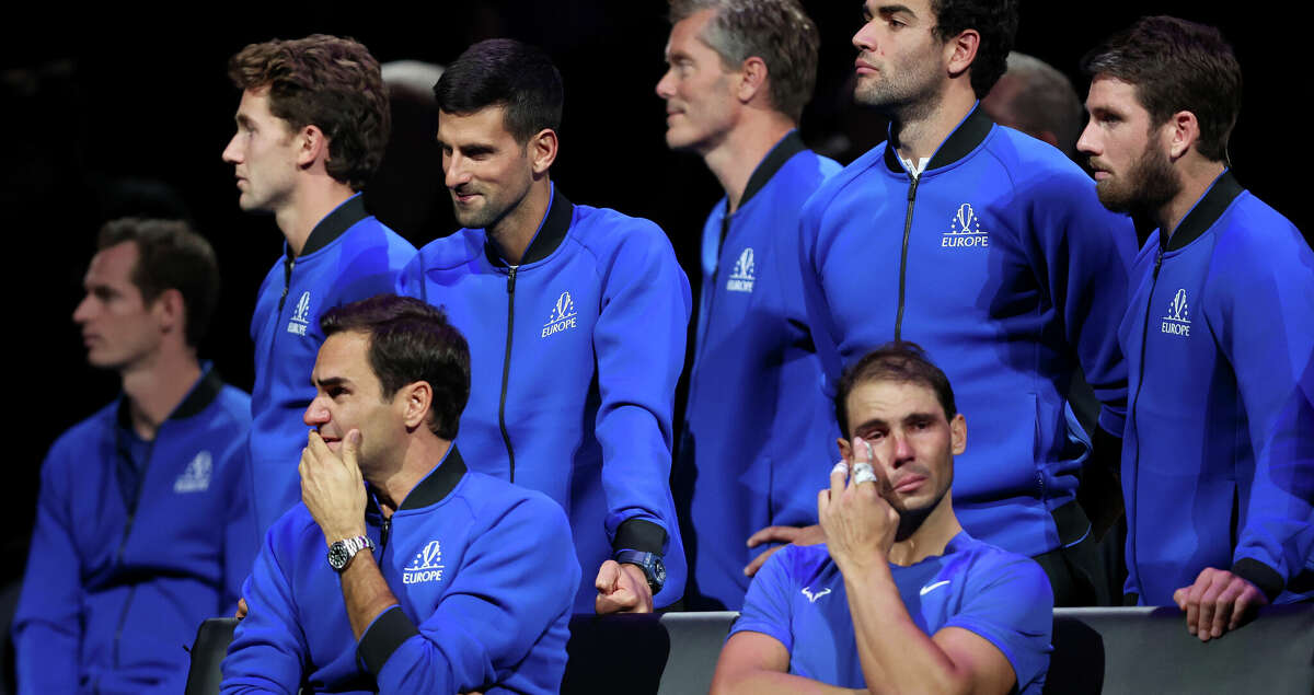 Roger Federer of Team Europe shows emotion alongside Rafael Nadal following his final match during Day One of the Laver Cup at The O2 Arena on September 23, 2022 in London, England. (Photo by Julian Finney/Getty Images for Laver Cup)