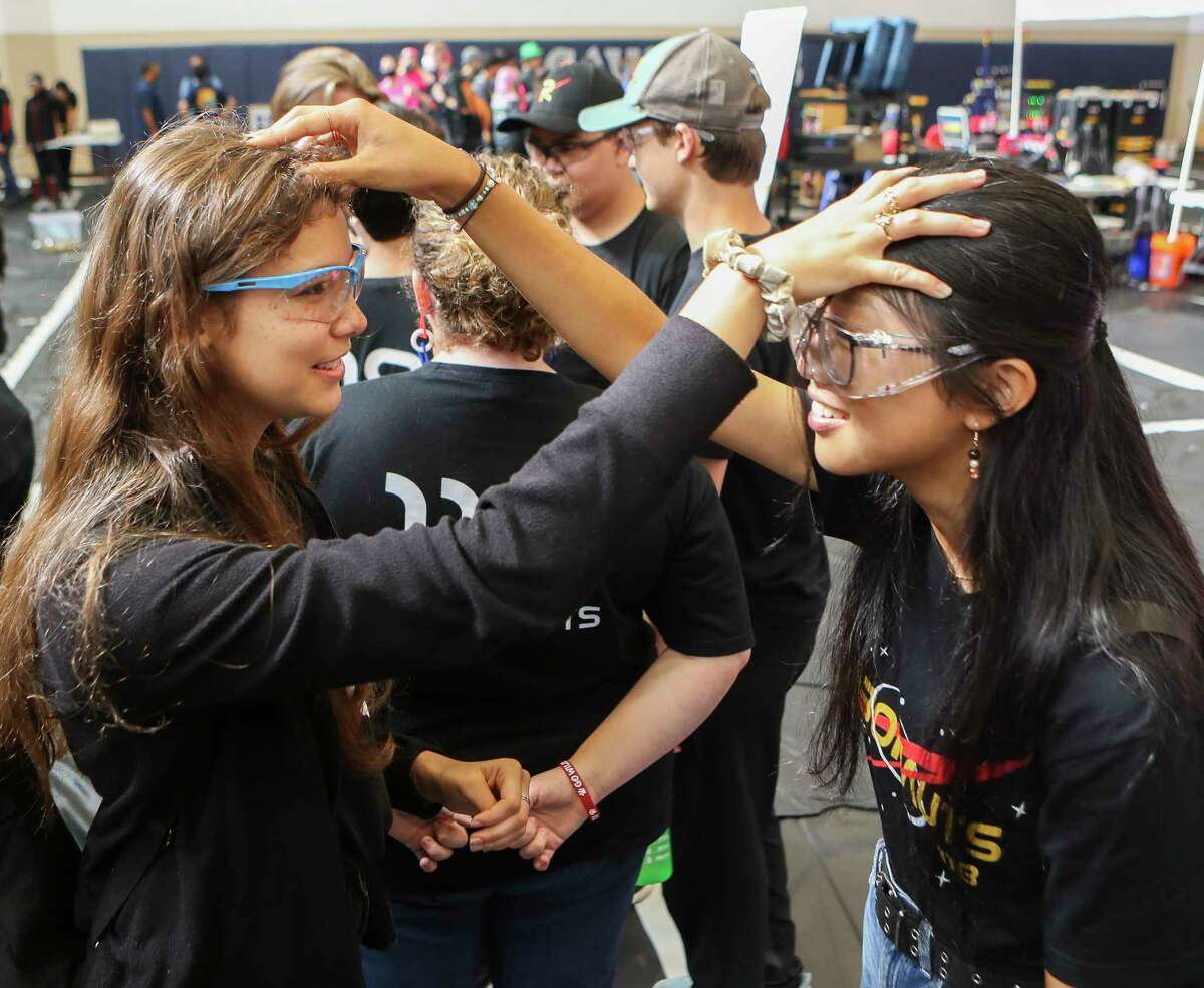 Kayla and Xiaoran of Pasadena ISD joke during the annual The Remix Robotics Competition at College Park High School, Saturday, September 24, 2022, in The Woodlands.  The off-season event featured 32 teams from Texas and Louisiana.
