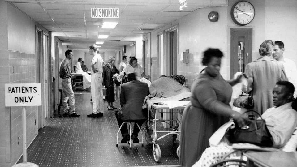 Patients in the hallway of the emergency room area at Jefferson Davis Hospital on Jan. 14, 1962.