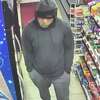 A photo of a man suspected of robbing two gas stations Saturday night in North Haven, according to police.