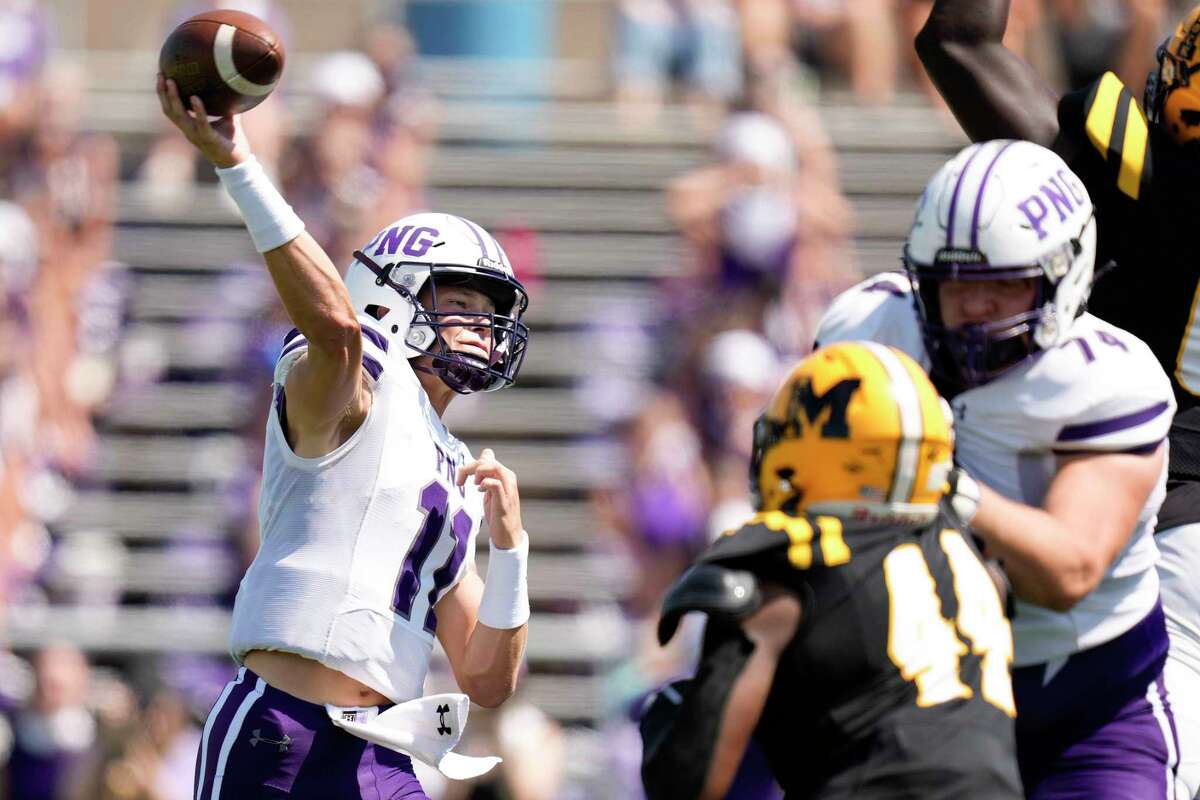 Port Neches-Groves quarterback Cole Crippen (11) throws a pass during the first half of a high school football game against Marshall, Saturday, Sept. 24, 2022, in Sugar Land, TX.