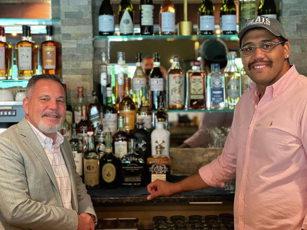  From left, Gaylordsville residents and food enthusiasts Edward Maynard and Brian Cabrera opened Good Eats Restaurant & Bar in New Milford on Sept. 21.