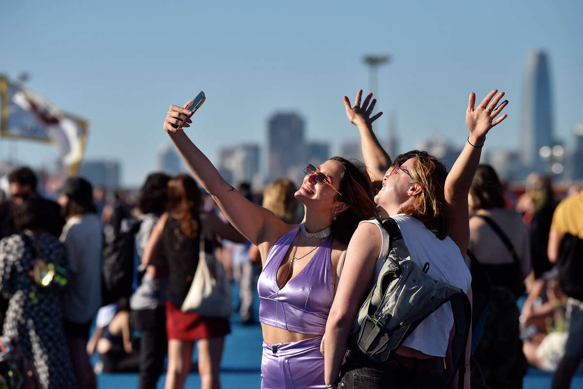 A group of concertgoers takes a selfie during Portola Music Festival on Saturday.