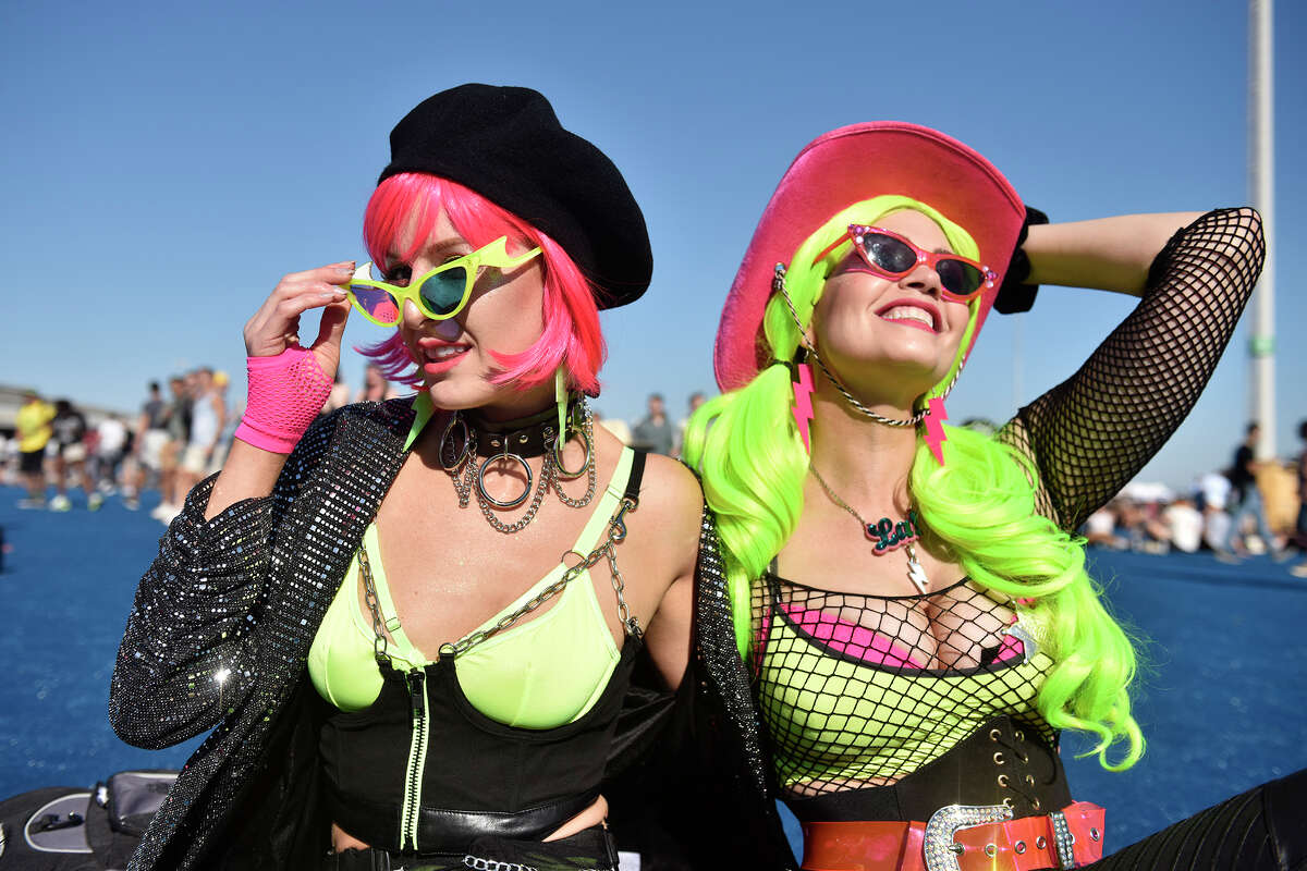 Timmary Van Horn, left, and Laura Presley of Austin, Texas, hang out near the Pier Stage at Portola Music Festival on Saturday. 