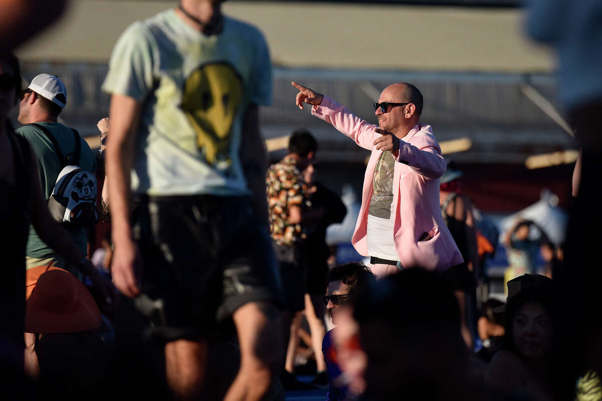 Oakland's Ben Hopfer dances during Jungle's set on the Pier Stage at the Portola Music Festival on Saturday.