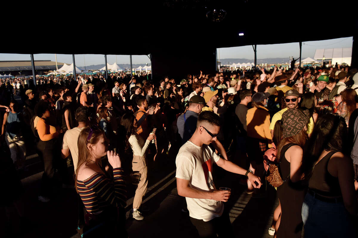 Festival-goers dance to Slowthai inside the ship's tent at the Portola Music Festival on Saturday.