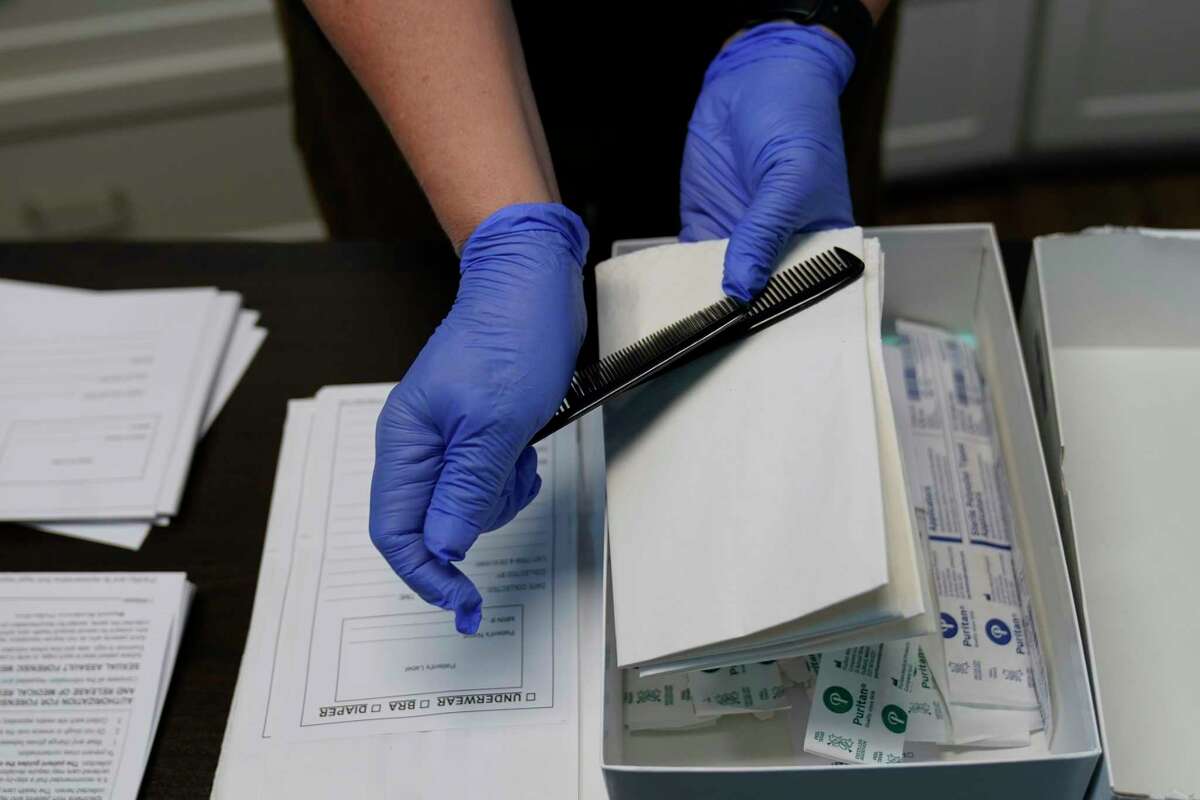 A Sexual Assault Evidence Collection Kit, or Rape Kit, is unpacked in an examination room, Wednesday, Aug. 31, 2022, in Austin, Texas. After a Texas law banning abortions past about six weeks, even in cases of rape or incest, went into effect a year ago, Gov. Greg Abbott said the state would strive to "eliminate all rapists from the streets."