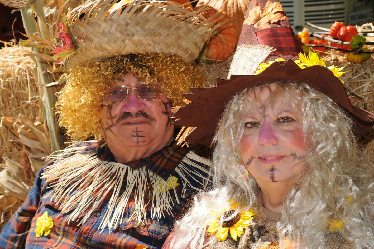 Mr. and Mrs. Scarecrow, Patches and Sunshine, await more visitors to their photo op station during the Wild Pickins Winery Fall Festival.   