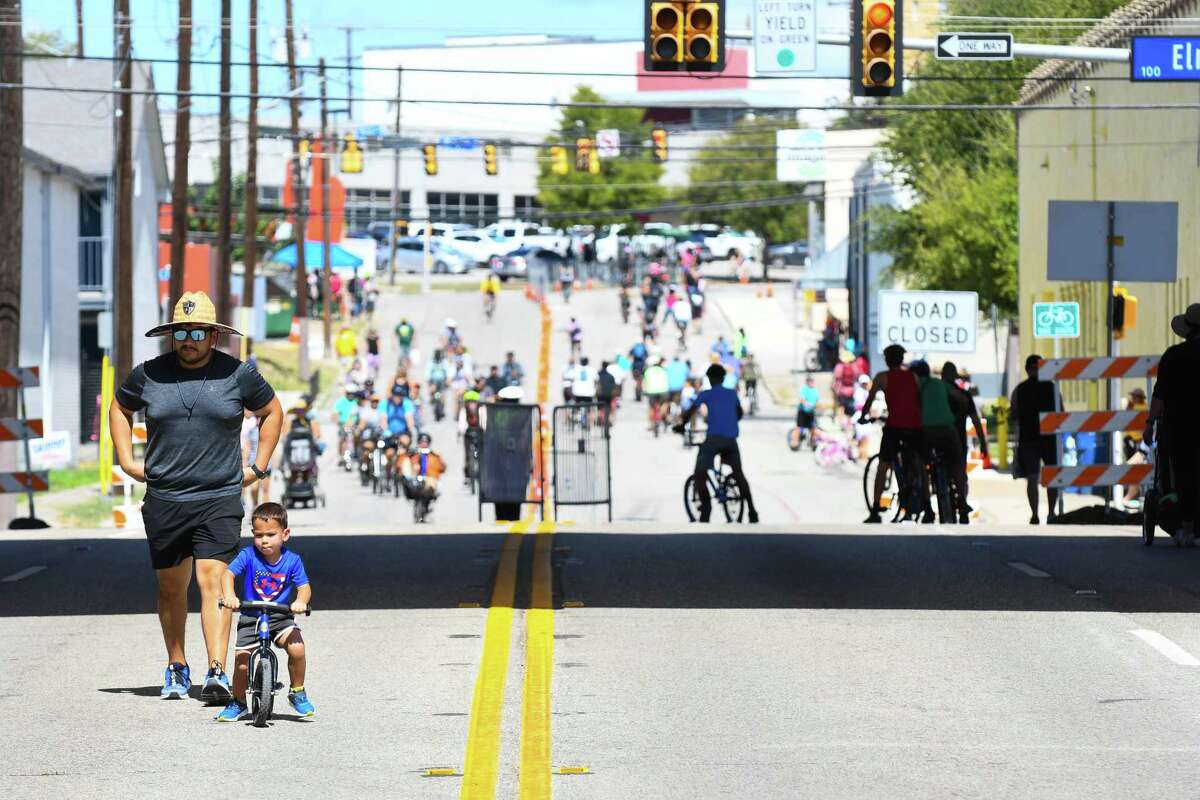 Cyclists ride down the street during Síclovía on Sunday. The free bi-annual event is organized by the YMCA of Greater San Antonio and closes city streets for the public to exercise.