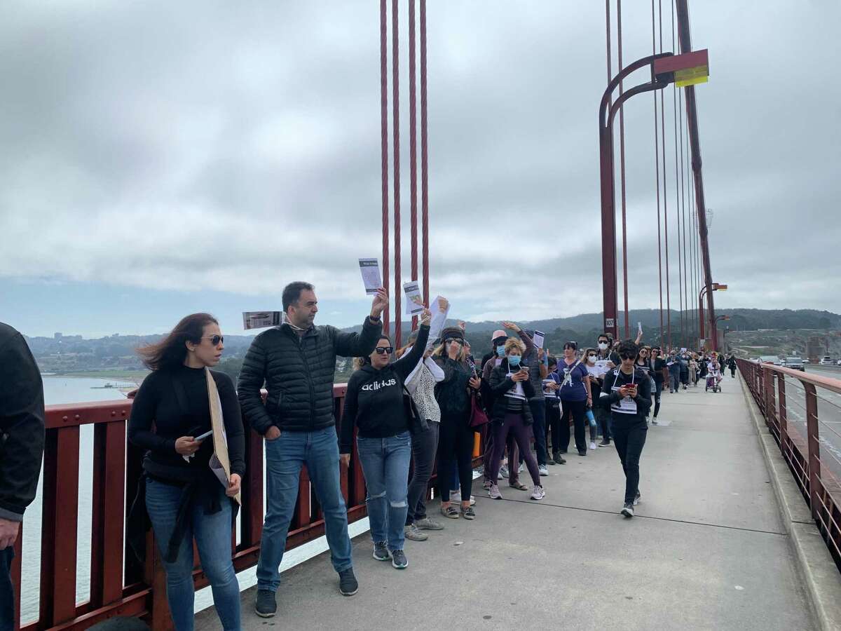 Bay Area residents march over the Golden Gate Bridge in a show of solidarity with Iranian protesters.