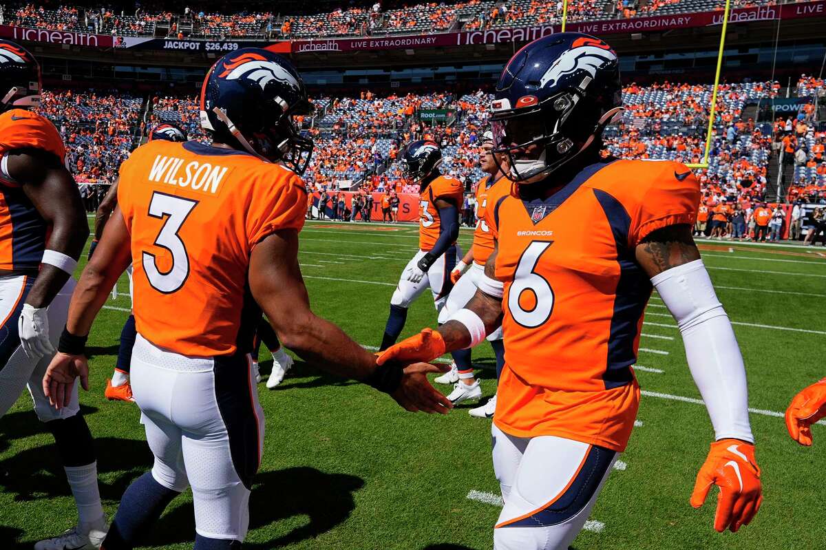 Denver Broncos safety P.J. Locke (37) runs a play against the Dallas Cowboys  in the first half of an NFL football game Saturday, Aug 13, 2022, in Denver.  (AP Photo/Bart Young Stock