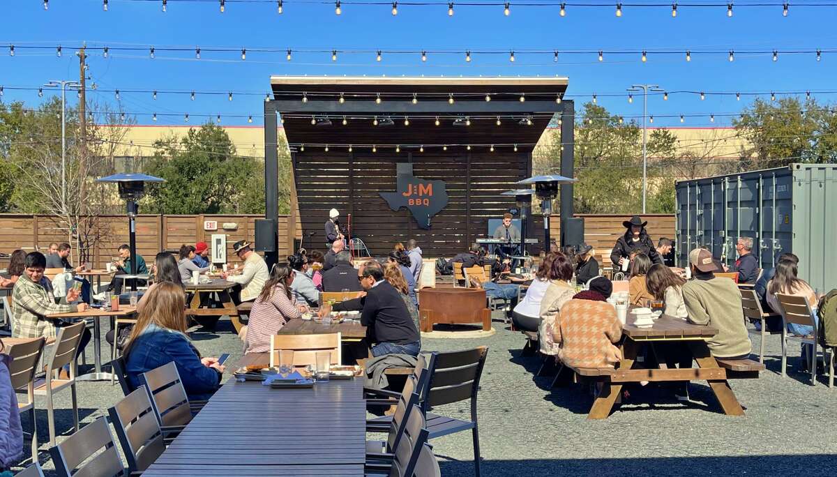 The beer garden at J-Bar-M Barbecue is a large patio area fronted by a live music stage.