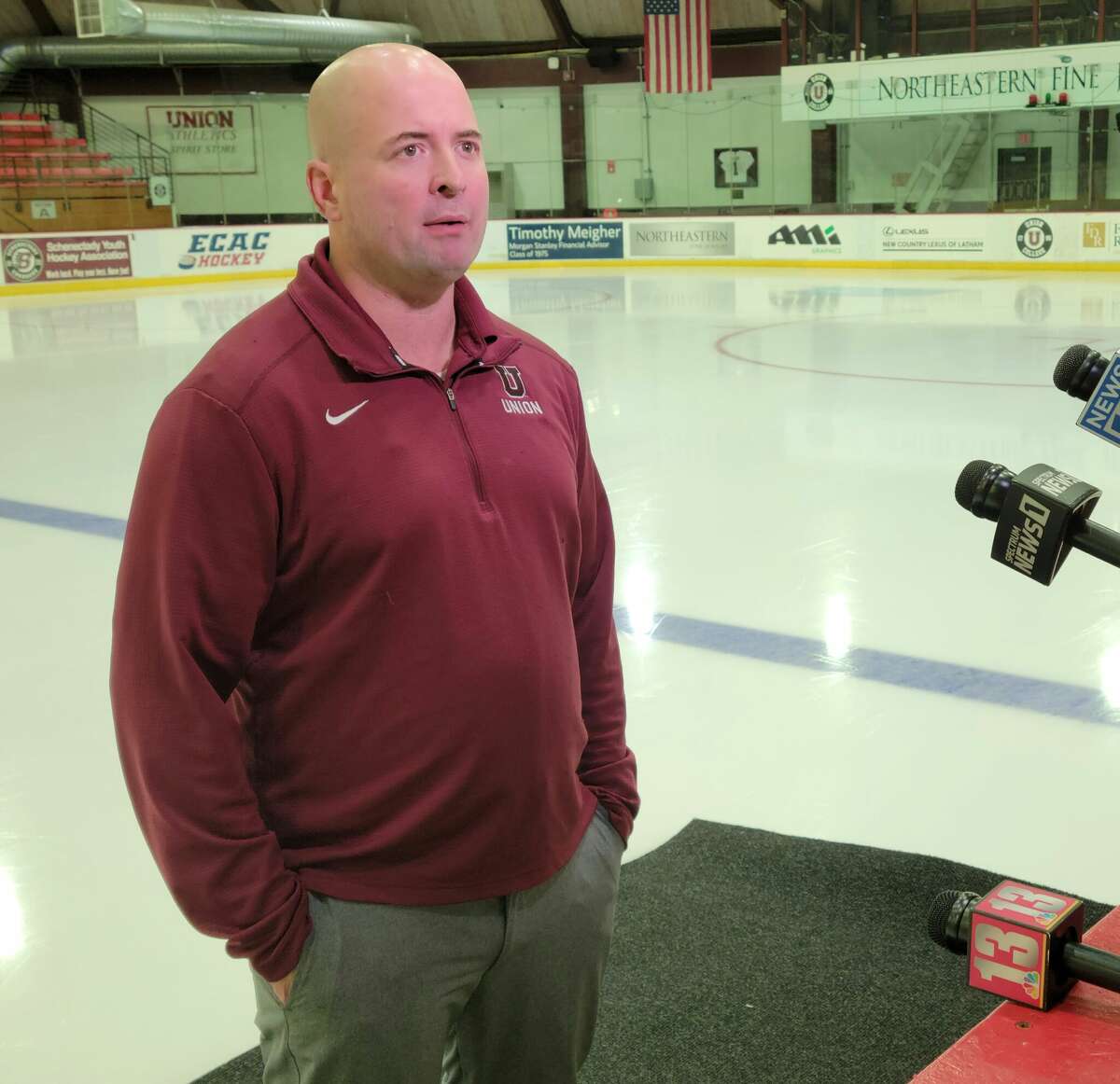Union hockey coach Josh Hauge talks with reporters at media day on Monday, Sept. 26, 2022.