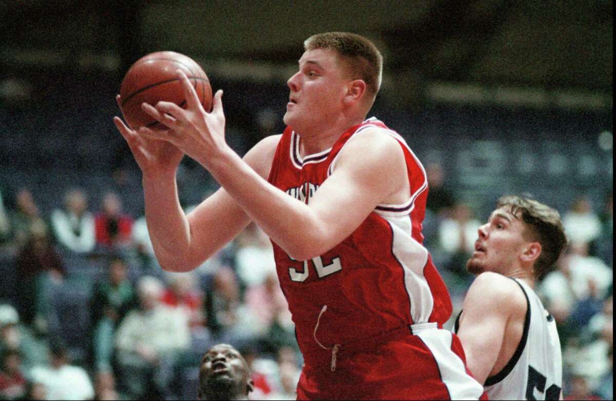 SPECIAL TO THE SAN FRANCISCO CHRONICLE. 1-9-1997 St. Mary's Brad Millard grabs rebound during a game against University of Portland. RAN AGAIN: 11/18/97,