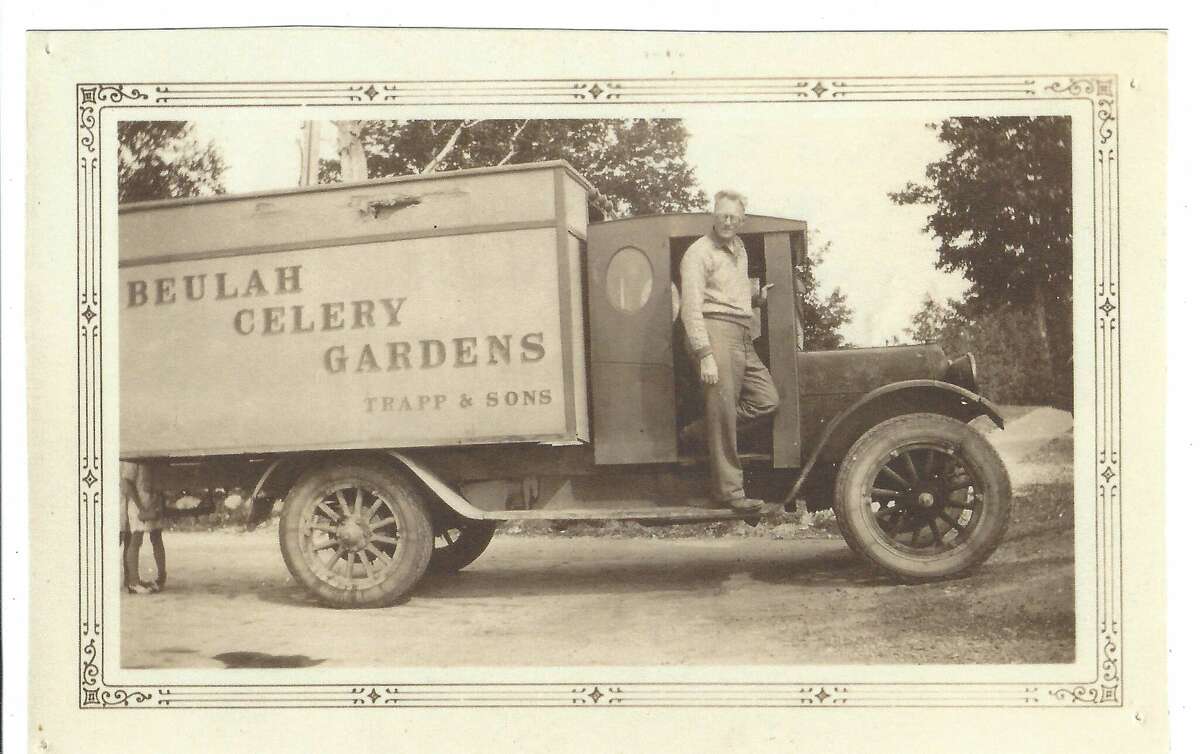 Martin Trapp with one of the Trapp and Sons Farm's (also known as Beulah Celery Gardens) first produce delivery trucks. 
